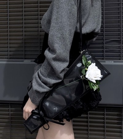 Rose Sleeve Clutch - © D'heygere